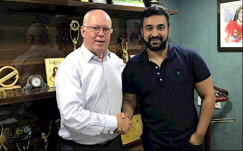 Raj Kundra handshake